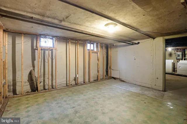 a view of a backyard with a fence