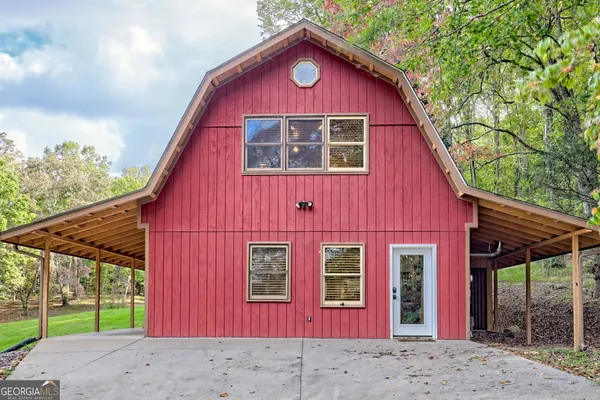 a swimming pool with wooden fence