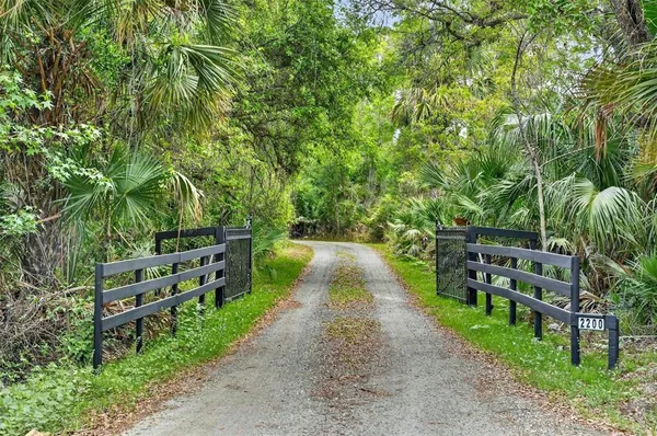 a view of a garden with outdoor seating