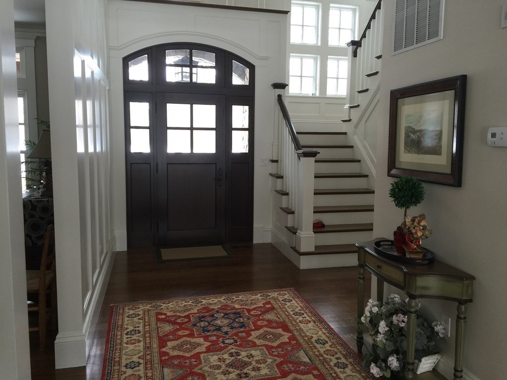 627 Bay Road Hamilton, MA 01982 - Photo 4 of 13 a view of an entryway with wooden floor