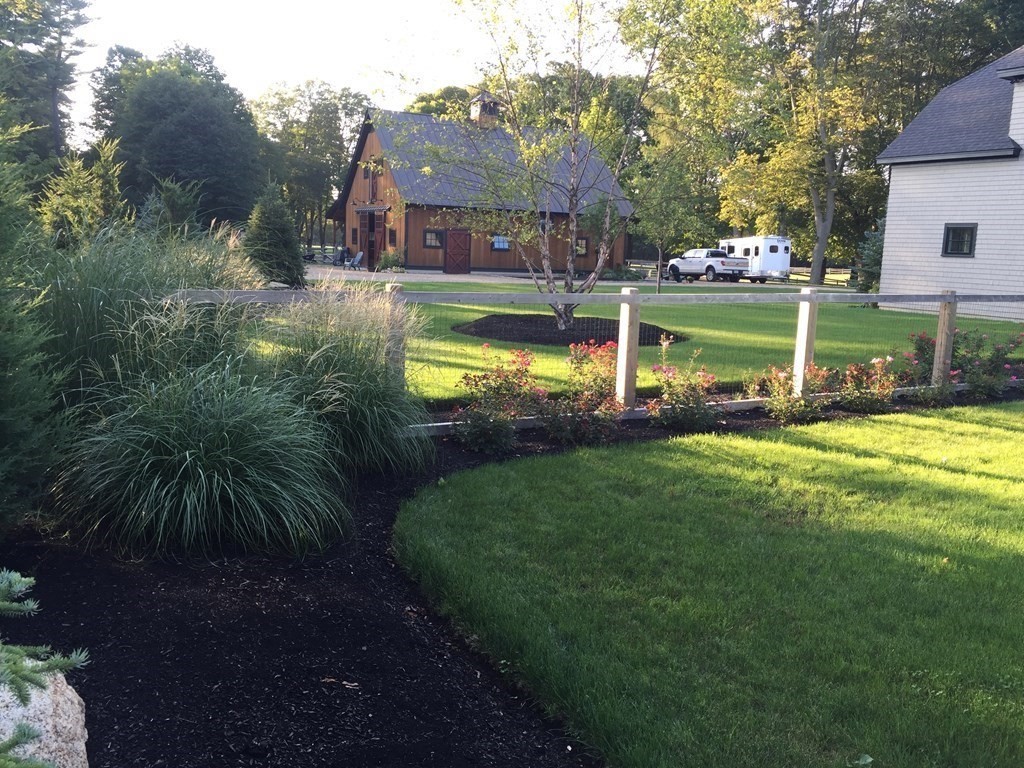 627 Bay Road Hamilton, MA 01982 - Photo 5 of 13 a view of a house with a yard porch and sitting area