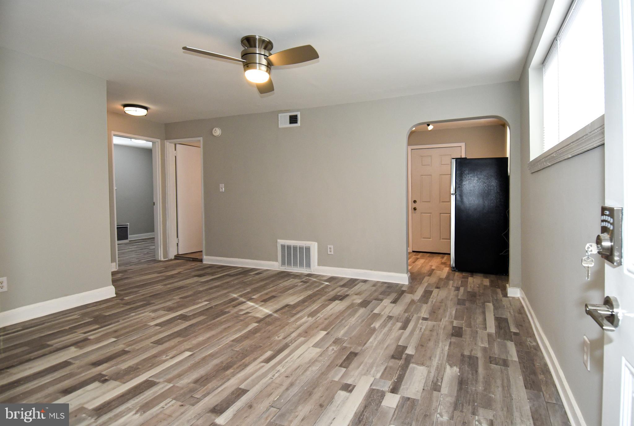 8208 Bellefonte Lane, Unit 5 Clinton, MD 20735 - Photo 1 of 17 Spacious, modern living area with natural light.