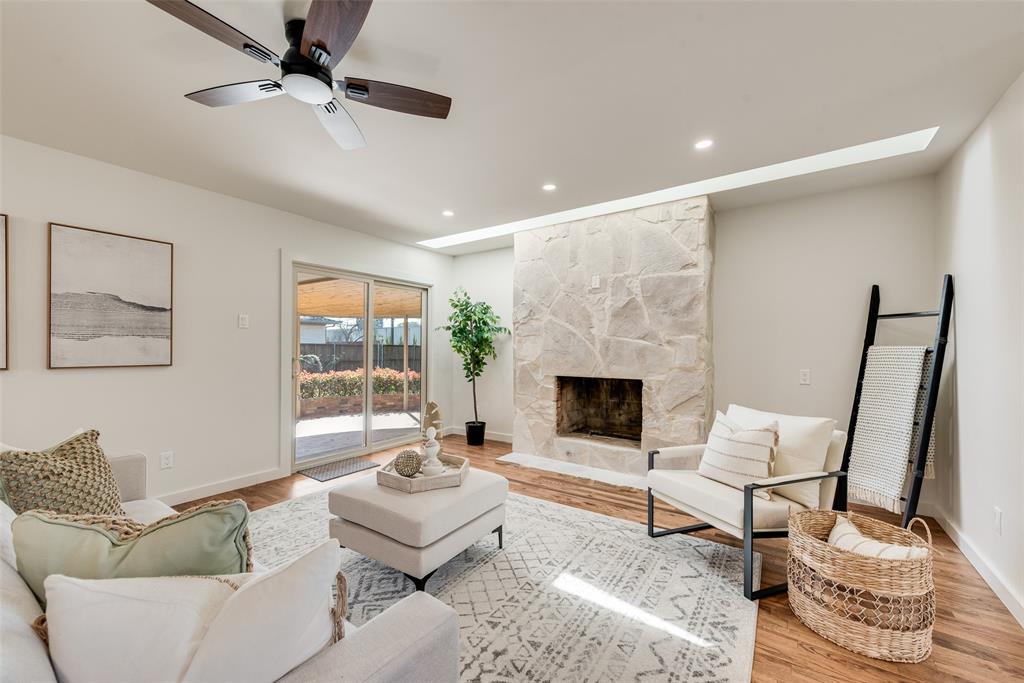 3106 Sharpview Lane Dallas, TX 75228 - Photo 6 of 33 a living room with furniture and a fireplace
