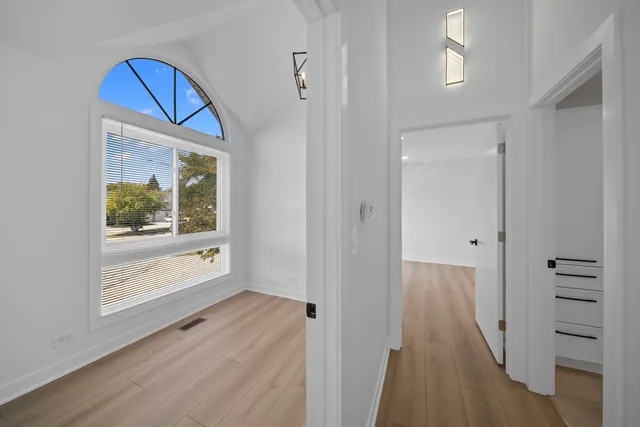 a view of a hallway with front door