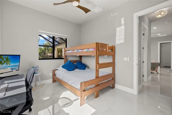 a room with furniture and a flat screen tv