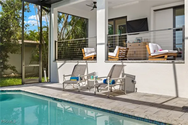 a kitchen with sink and window