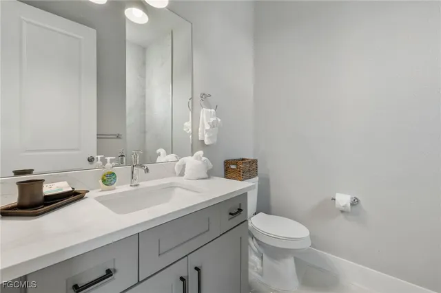 a room with a table and potted plant