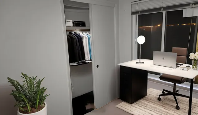 a view of a bathroom with a sink and mirror