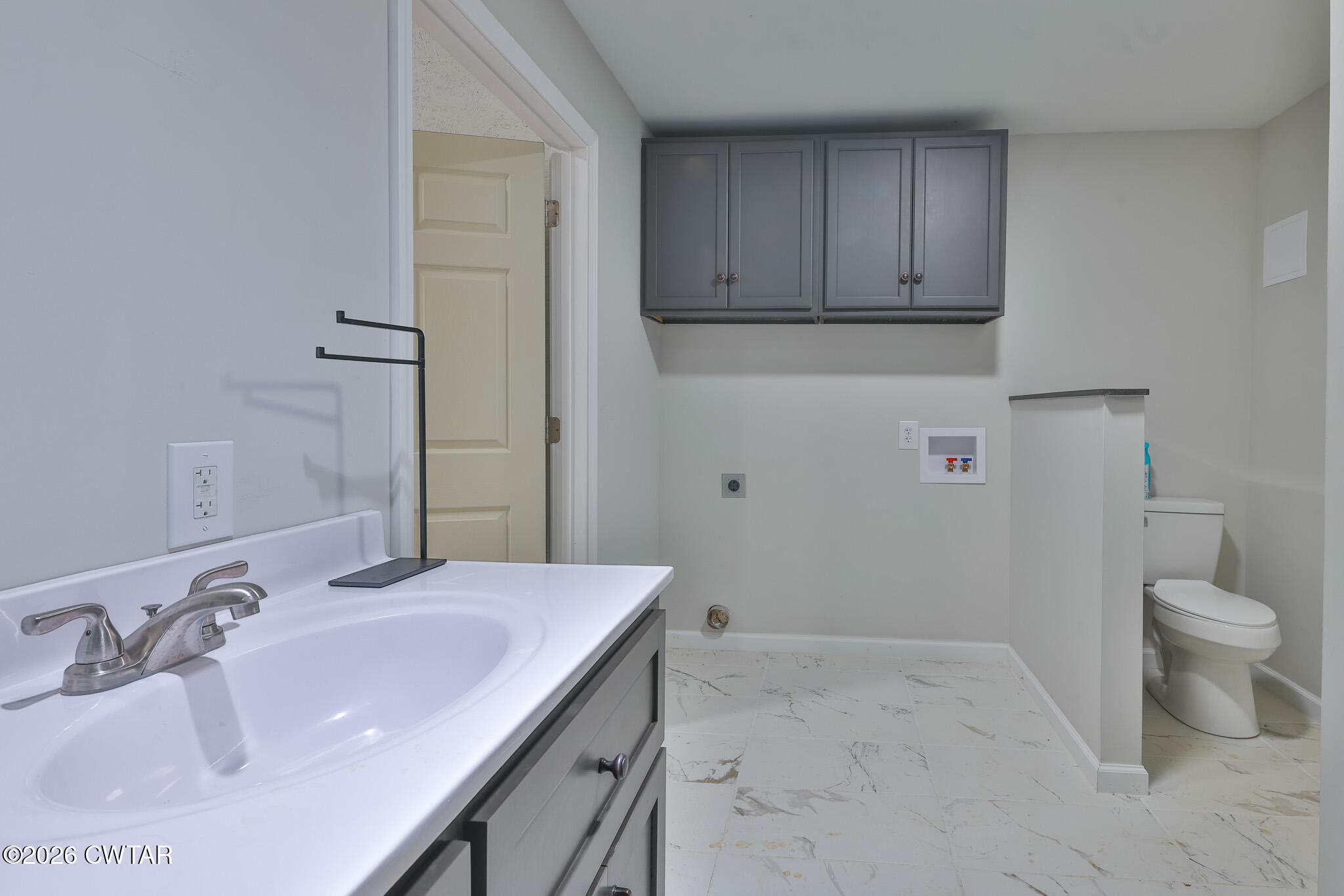 0 Pond Church Road Alamo, TN 38001 - Photo 16 of 18 a bathroom with a sink toilet and vanity