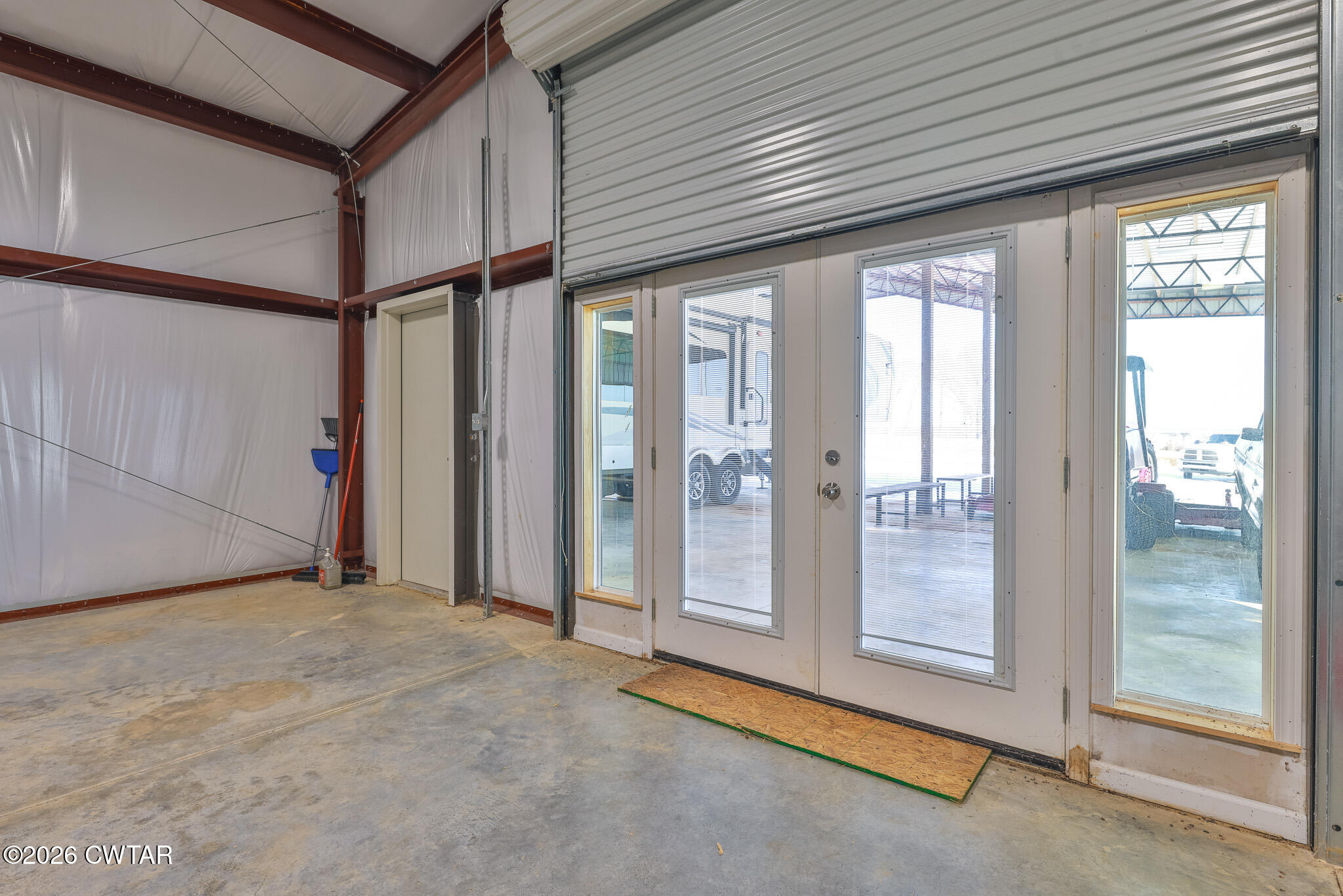 0 Pond Church Road Alamo, TN 38001 - Photo 17 of 18 a view of an empty room with sliding door