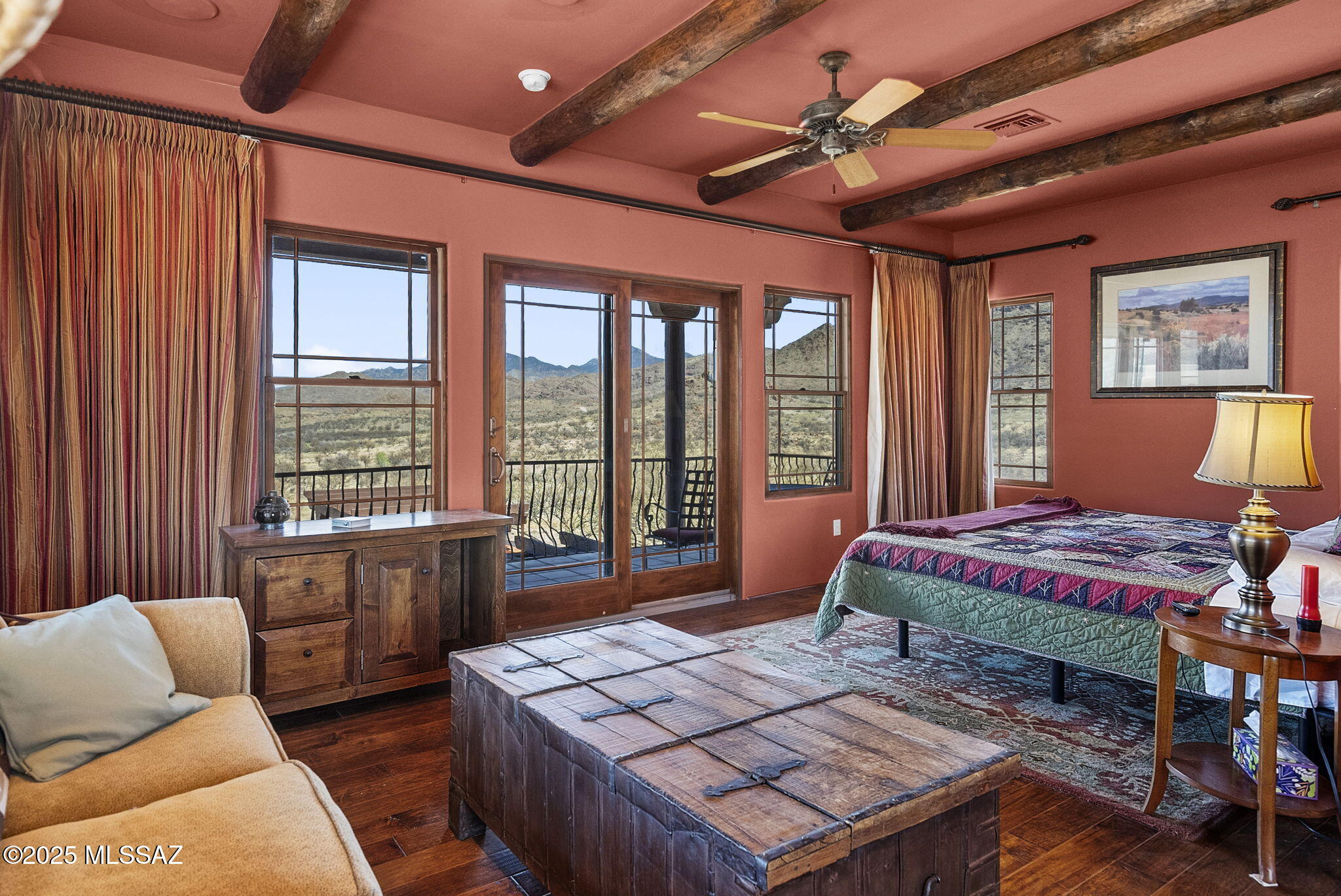 1265 Morning Star Drive Rio Rico, AZ 85648 - Photo 26 of 50 a bedroom with furniture and a large window