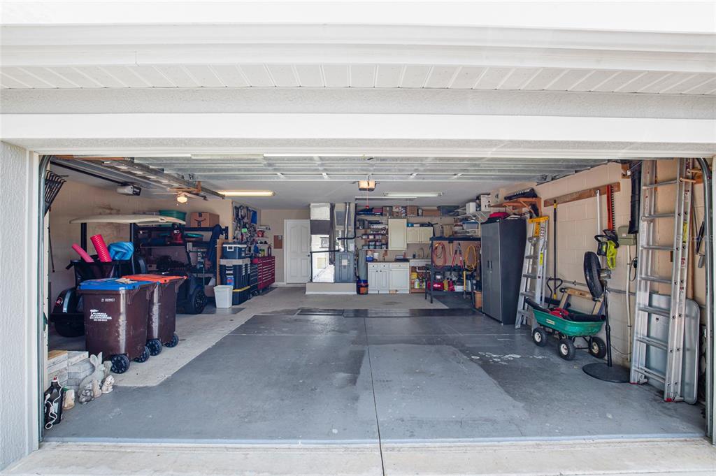 16411 Southwest 14th Avenue Road Ocala, FL 34473 - Photo 44 of 59 a view of a garage with gym equipment