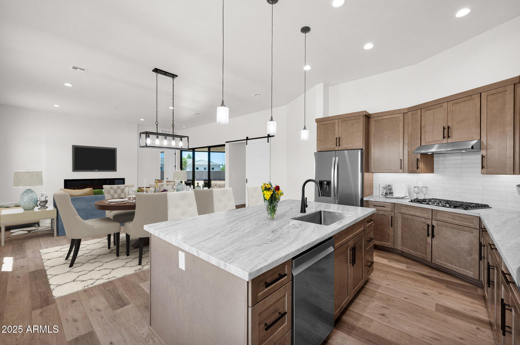 553 West Cavalry Road New River, AZ 85087 - Photo 1 of 26 a kitchen with stainless steel appliances granite countertop a stove top oven a sink island and a refrigerator