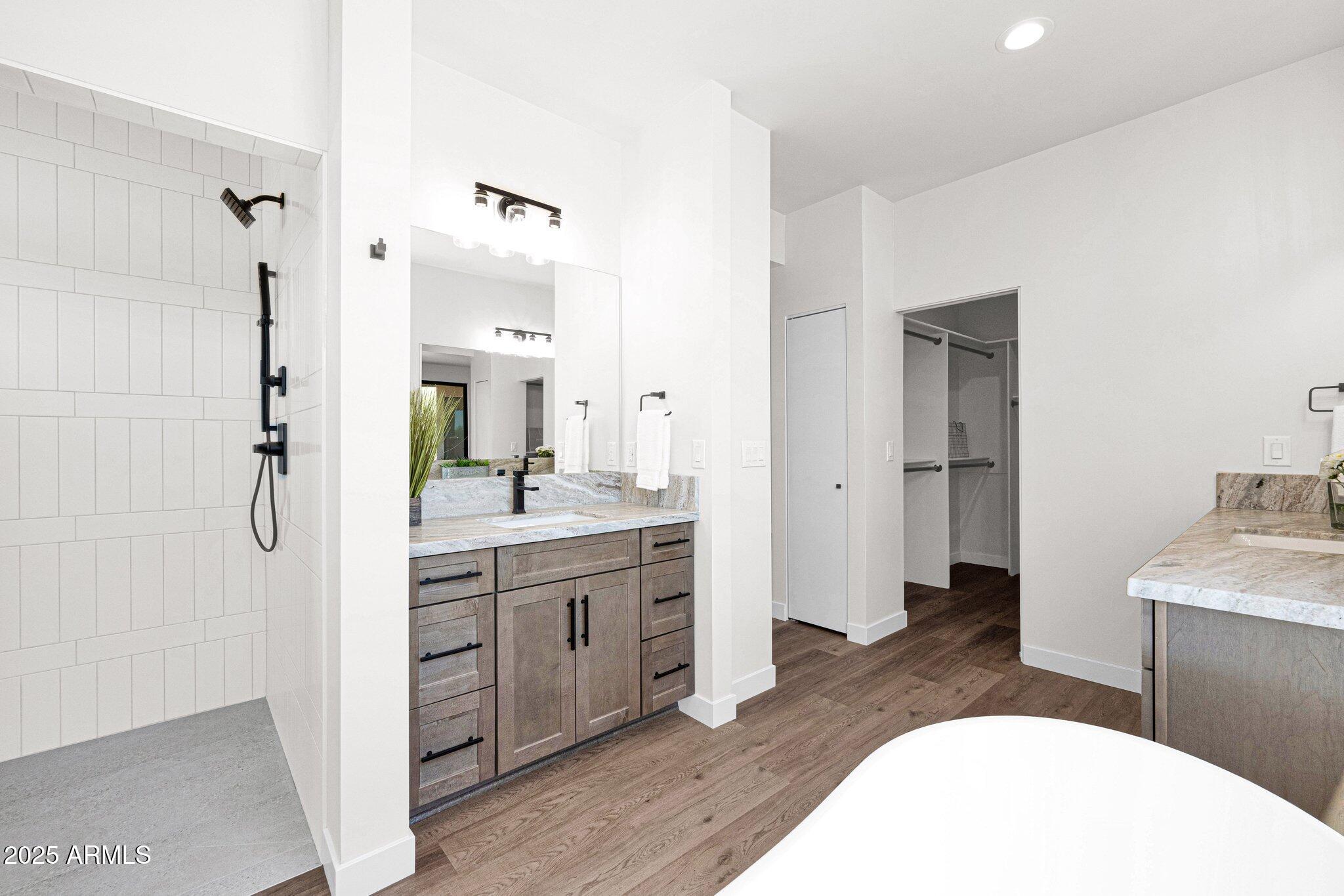 553 West Cavalry Road New River, AZ 85087 - Photo 15 of 26 a bathroom with a sink and a mirror