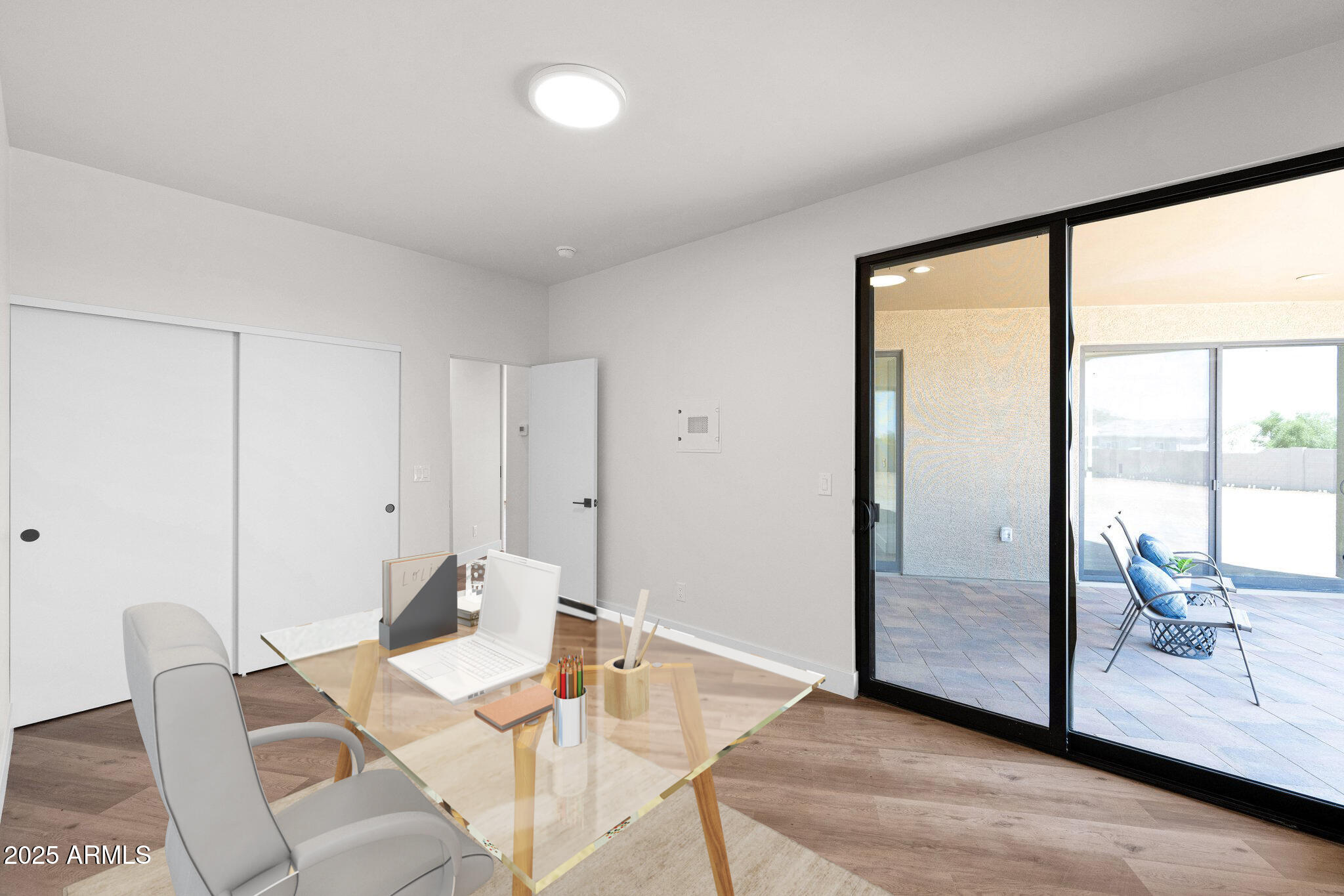 553 West Cavalry Road New River, AZ 85087 - Photo 21 of 26 a view of a livingroom with furniture wooden floor and a floor to ceiling window