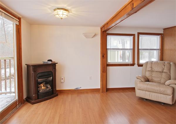 1 East Shore Road Holbrook, MA 02343 - Photo 4 of 16 a living room with furniture and a fireplace