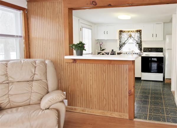1 East Shore Road Holbrook, MA 02343 - Photo 5 of 16 a living room with a couch and a window