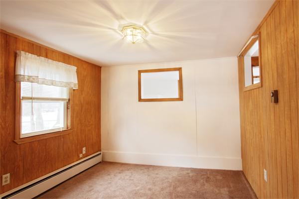 1 East Shore Road Holbrook, MA 02343 - Photo 7 of 16 a view of an empty room with a window