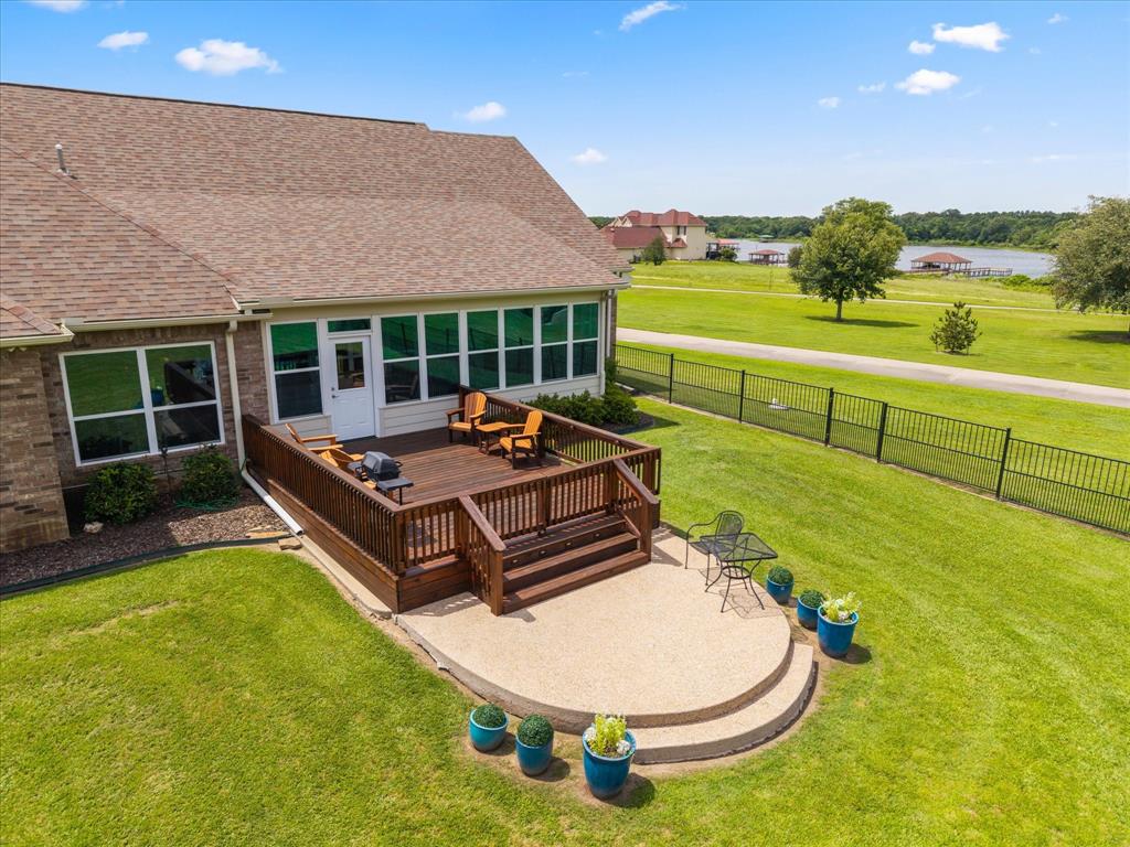 345 Rains County Road 3390 Emory, TX 75440 - Photo 7 of 39 a swimming pool with outdoor seating and yard