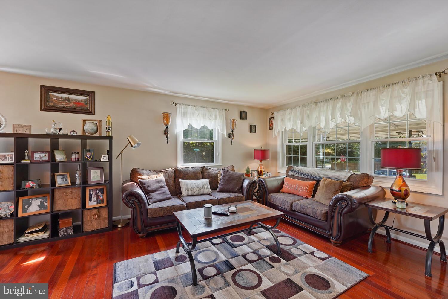 1101 Wynnbrook Road Secane, PA 19018 - Photo 2 of 19 a living room with furniture a rug and a window
