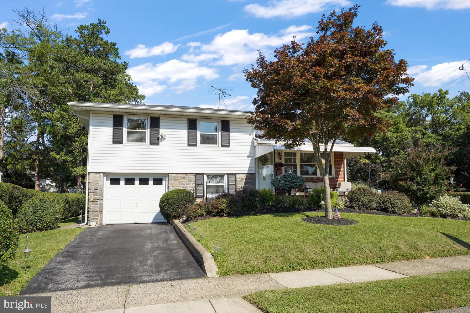 1101 Wynnbrook Road Secane, PA 19018 - Photo 18 of 19 a front view of a house with a yard