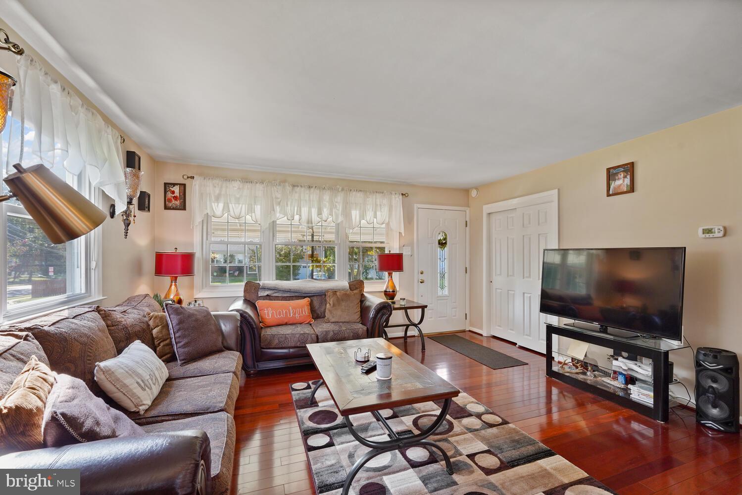1101 Wynnbrook Road Secane, PA 19018 - Photo 4 of 19 a living room with furniture and a flat screen tv