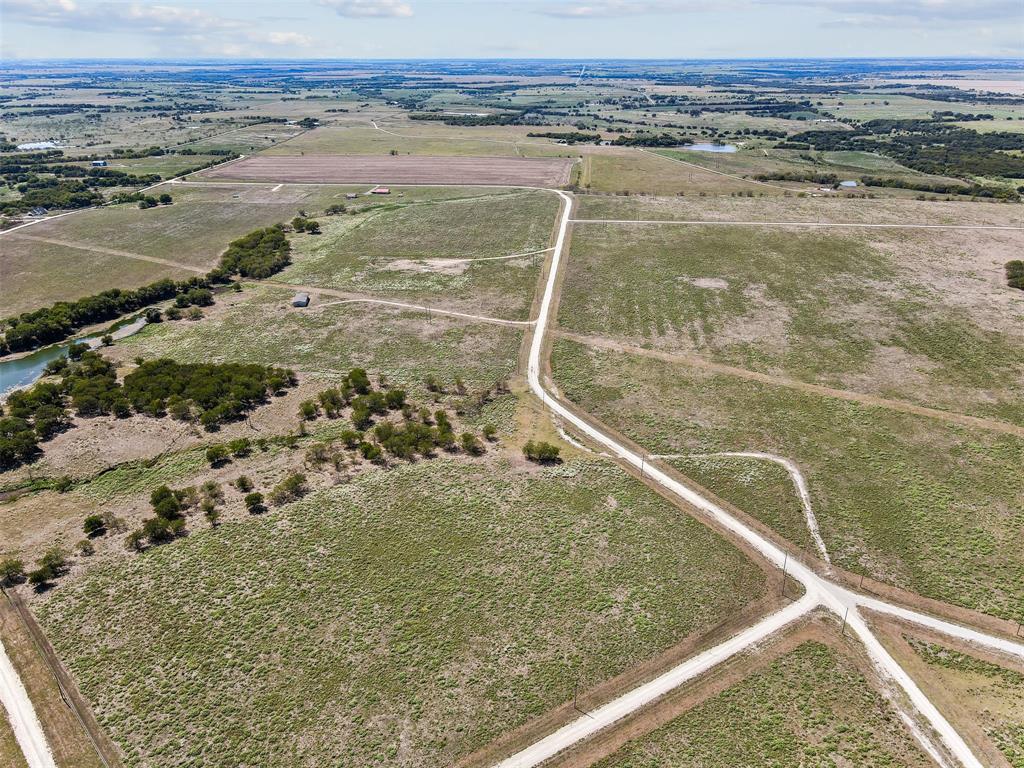 450 Private Road 453 Road, Unit LOT 12 Grandview, TX 76050 - Photo 7 of 15 Drone / aerial view featuring a rural view