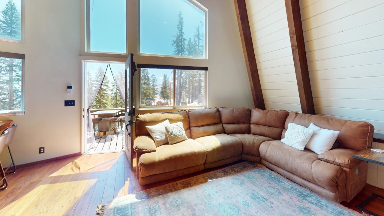 32 John Muir Road Mammoth Lakes, CA 93546 - Photo 11 of 42 a living room with furniture and a large window