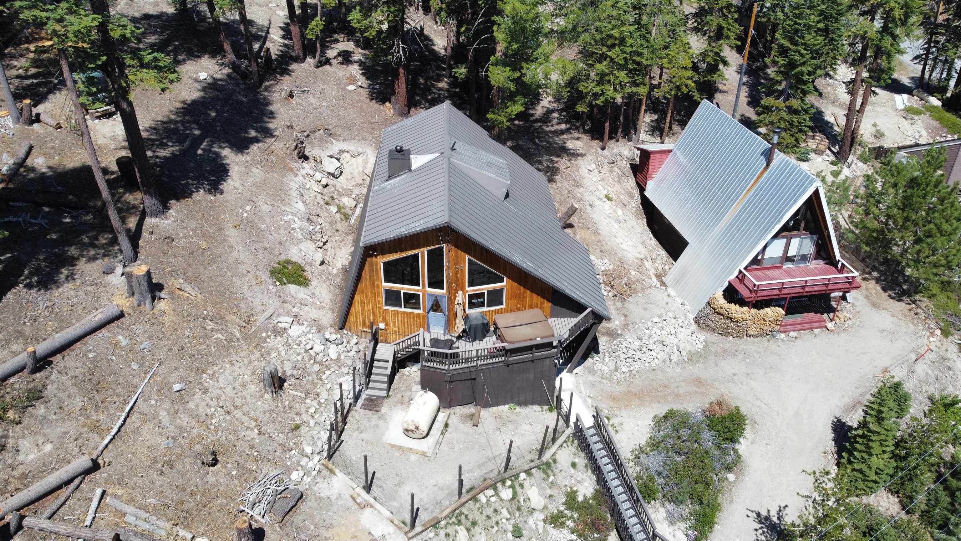 32 John Muir Road Mammoth Lakes, CA 93546 - Photo 36 of 42 an aerial view of a house with swimming pool and large trees