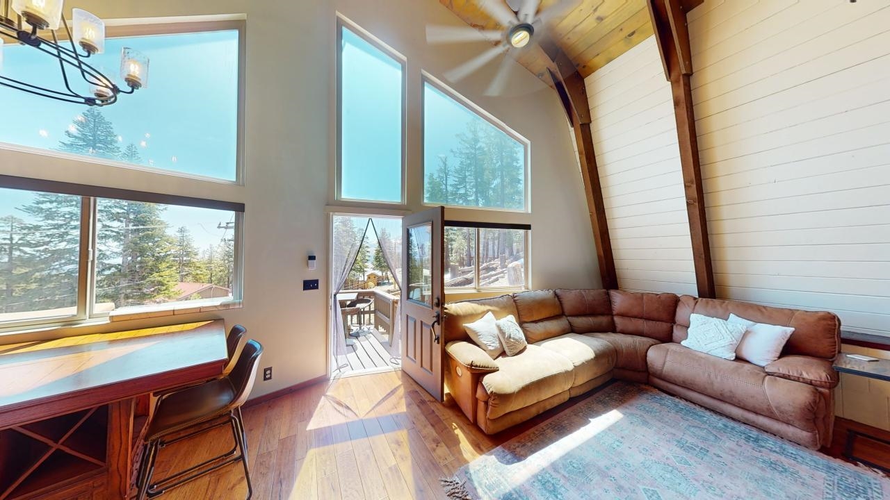32 John Muir Road Mammoth Lakes, CA 93546 - Photo 5 of 42 a living room with furniture and a large window
