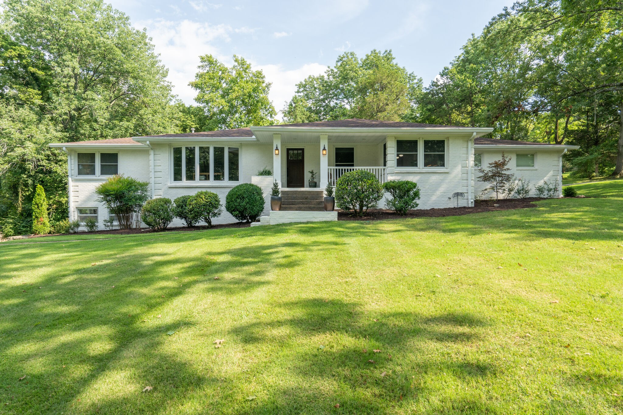 6357 Torrington Road Nashville, TN 37205 - Photo 1 of 48 a view of a house with a patio