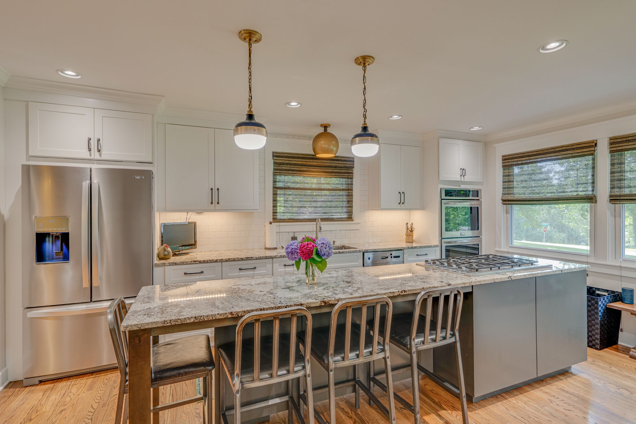 6357 Torrington Road Nashville, TN 37205 - Photo 13 of 48 a kitchen with stainless steel appliances granite countertop a kitchen island a stove a table and chairs in it