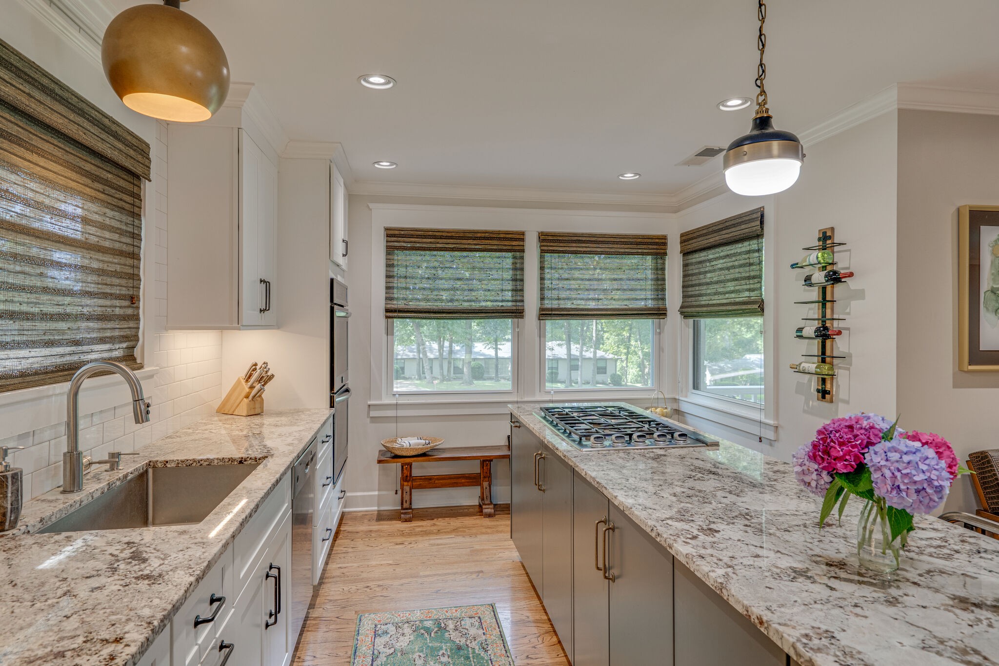 6357 Torrington Road Nashville, TN 37205 - Photo 16 of 48 a kitchen with granite countertop a sink stove and cabinets