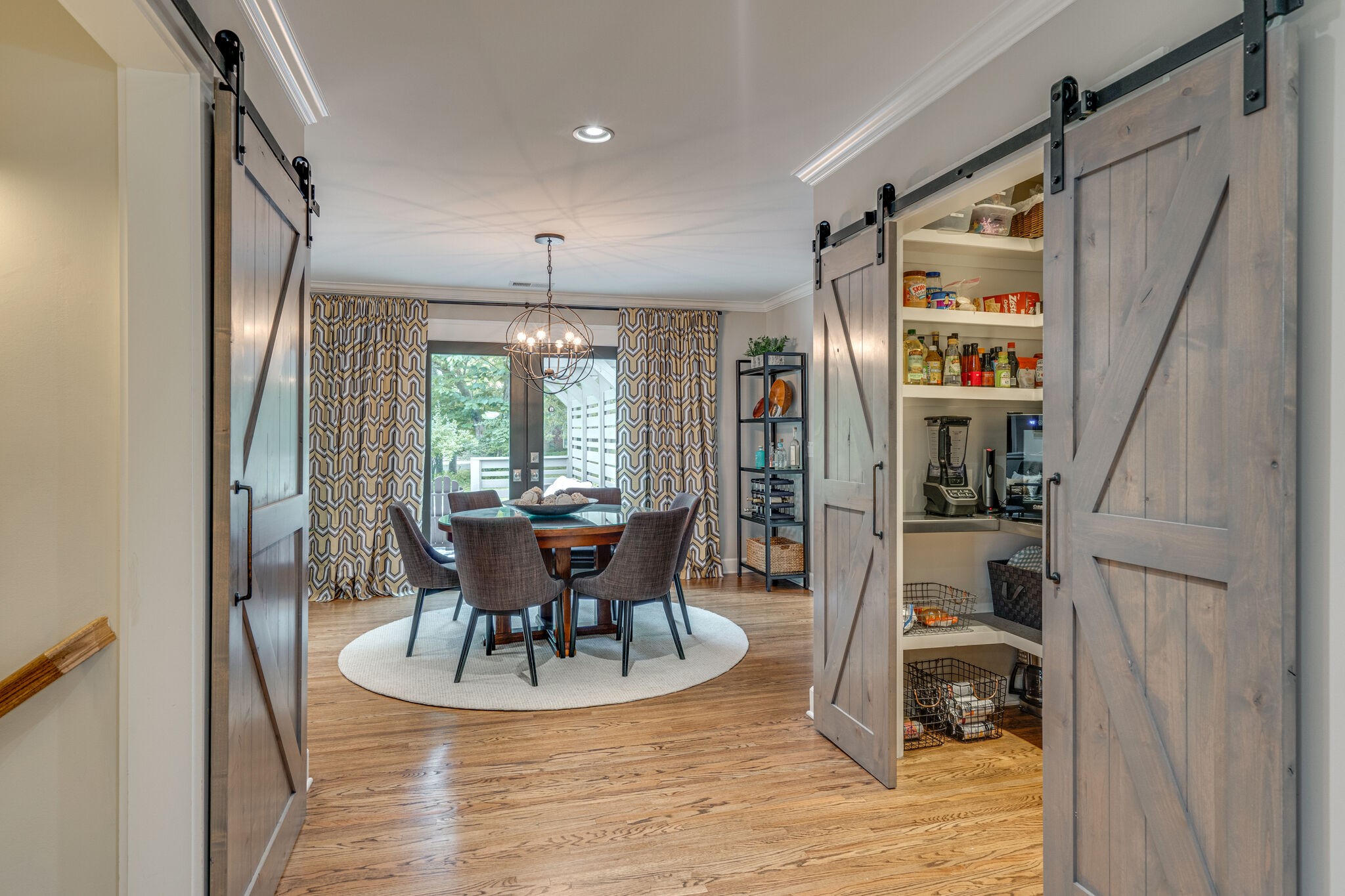 6357 Torrington Road Nashville, TN 37205 - Photo 17 of 48 a view of a dining room with furniture window and wooden floor