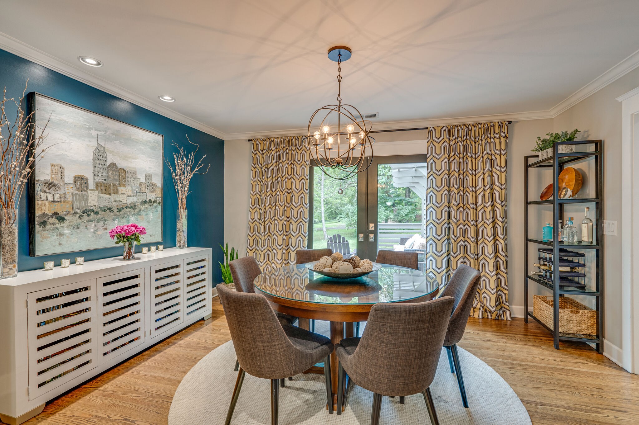 6357 Torrington Road Nashville, TN 37205 - Photo 18 of 48 a dining room with furniture a chandelier and wooden floor