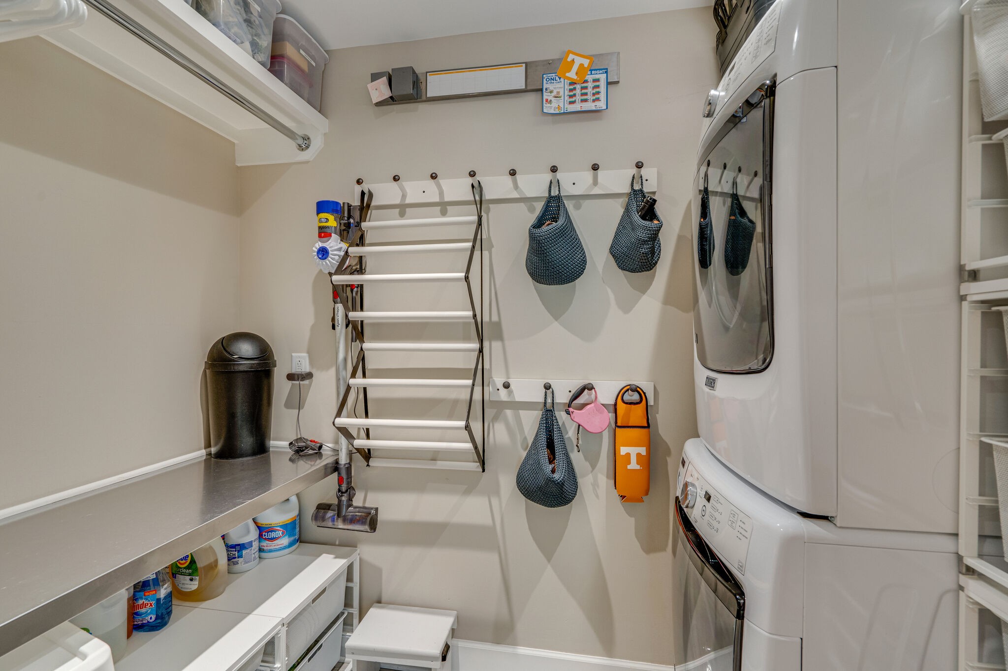 6357 Torrington Road Nashville, TN 37205 - Photo 27 of 48 a view of walk in closet with clothes and shoes