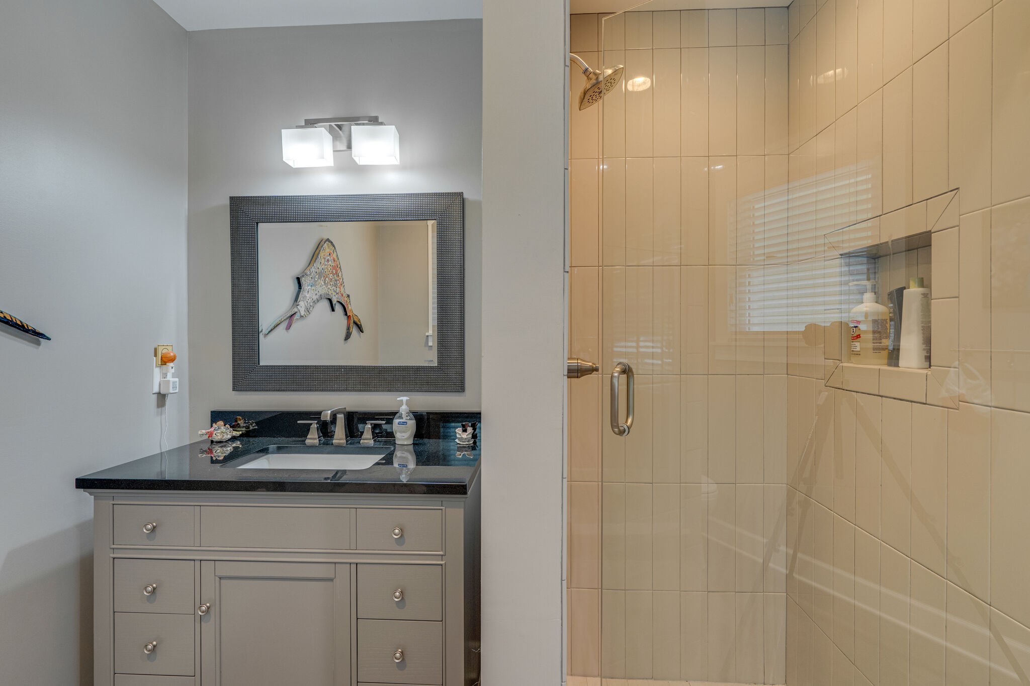 6357 Torrington Road Nashville, TN 37205 - Photo 33 of 48 a bathroom with a granite countertop sink a mirror and vanity