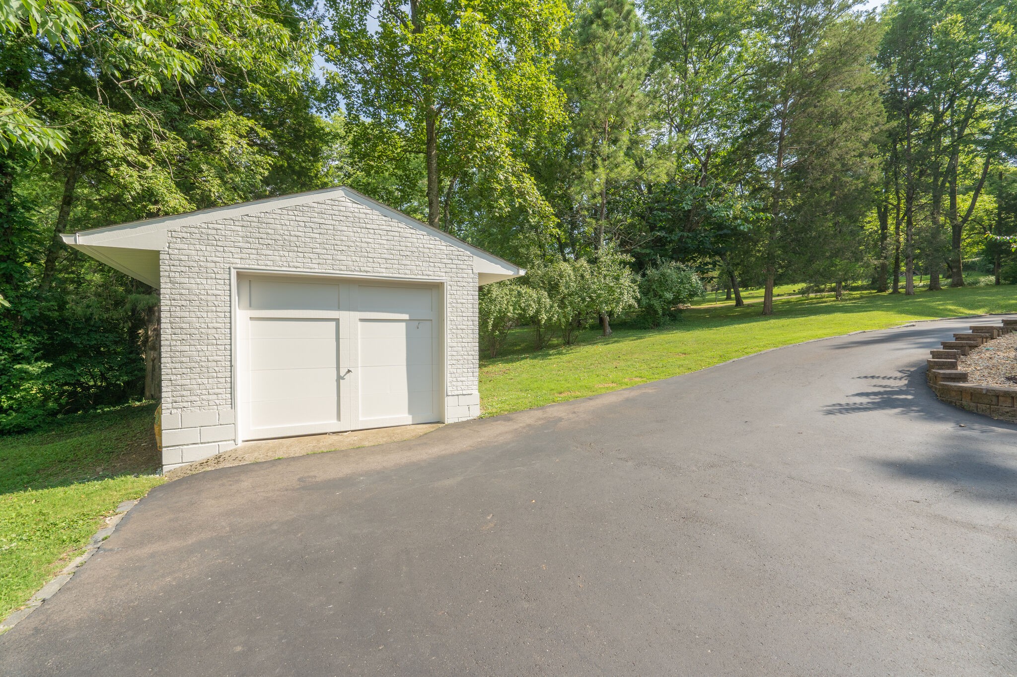 6357 Torrington Road Nashville, TN 37205 - Photo 47 of 48 a view of a house with a yard and large tree