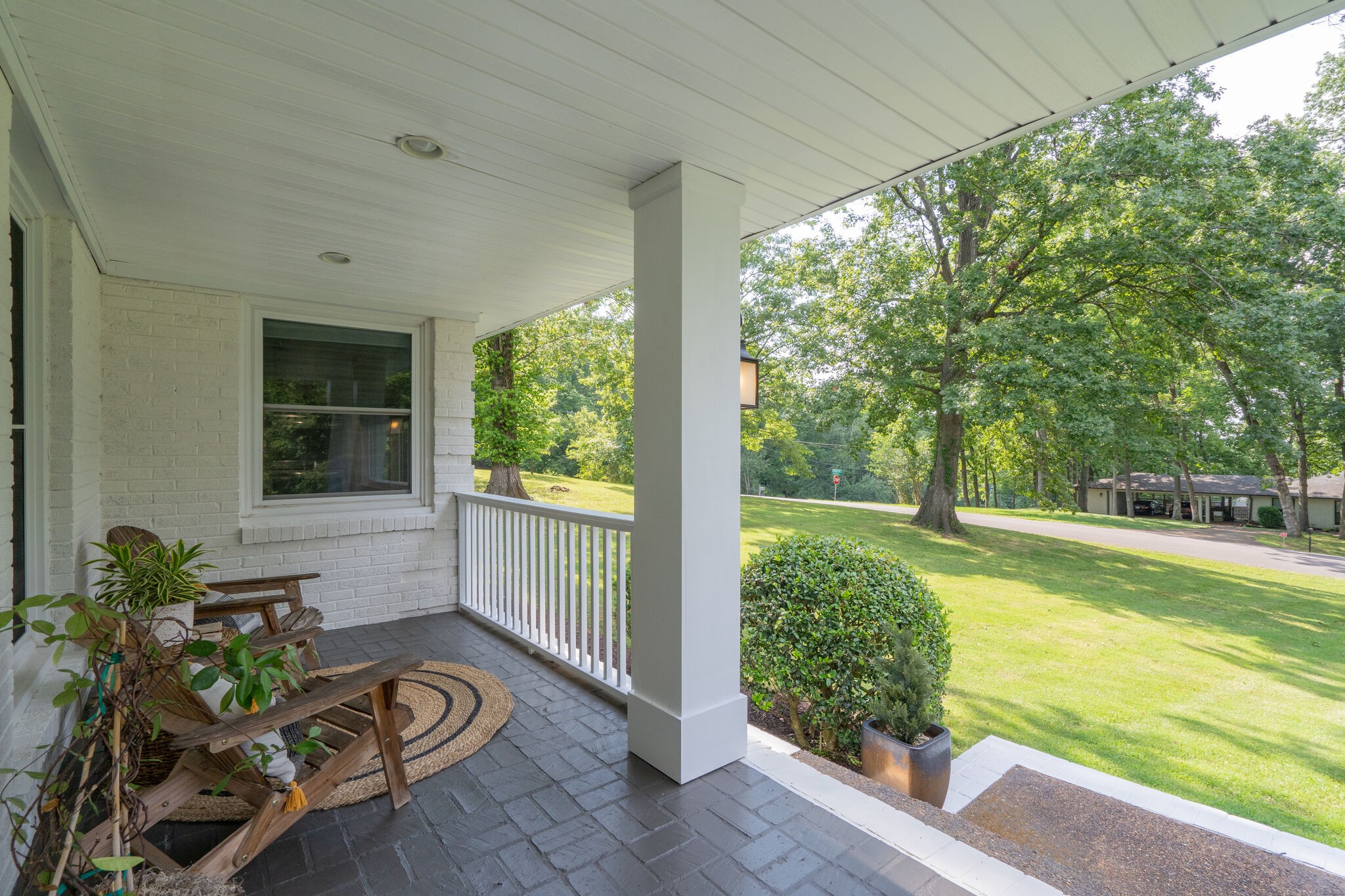 6357 Torrington Road Nashville, TN 37205 - Photo 7 of 48 a view of a porch with furniture and garden