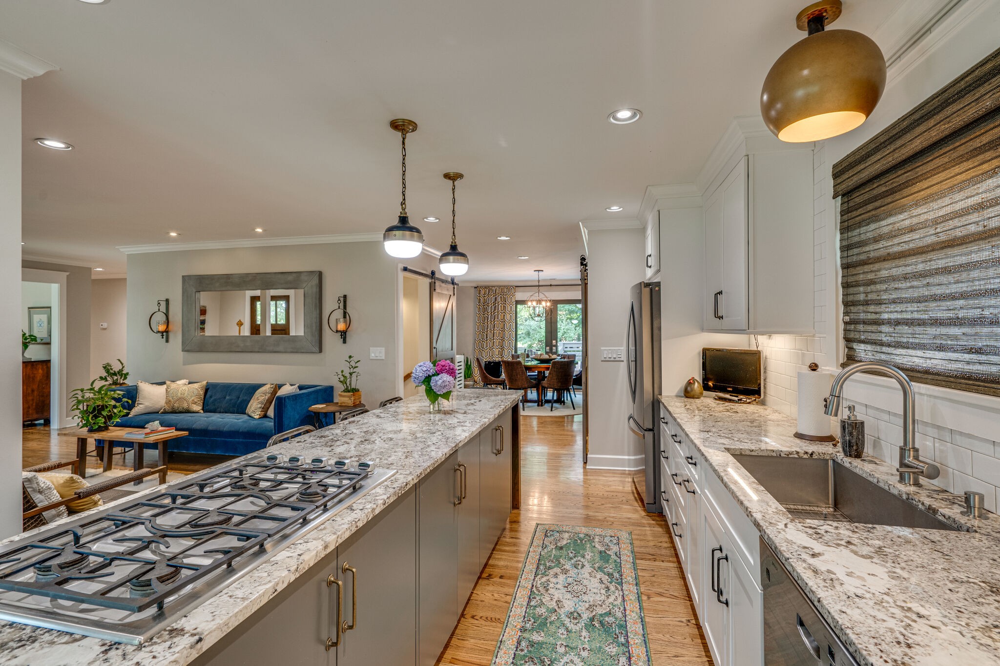 6357 Torrington Road Nashville, TN 37205 - Photo 10 of 48 a large kitchen with stainless steel appliances granite countertop a stove and a sink