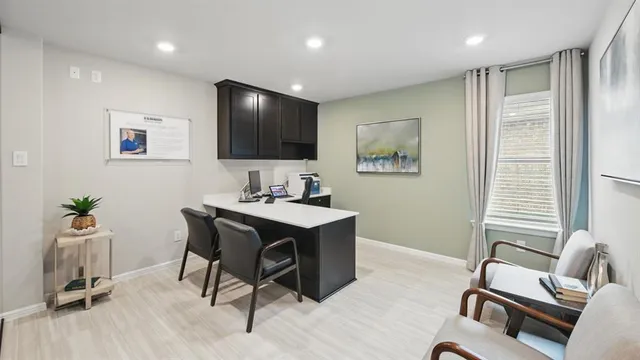 a view of a dining room with furniture