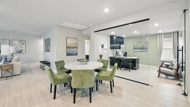 a living room with granite countertop furniture and a table