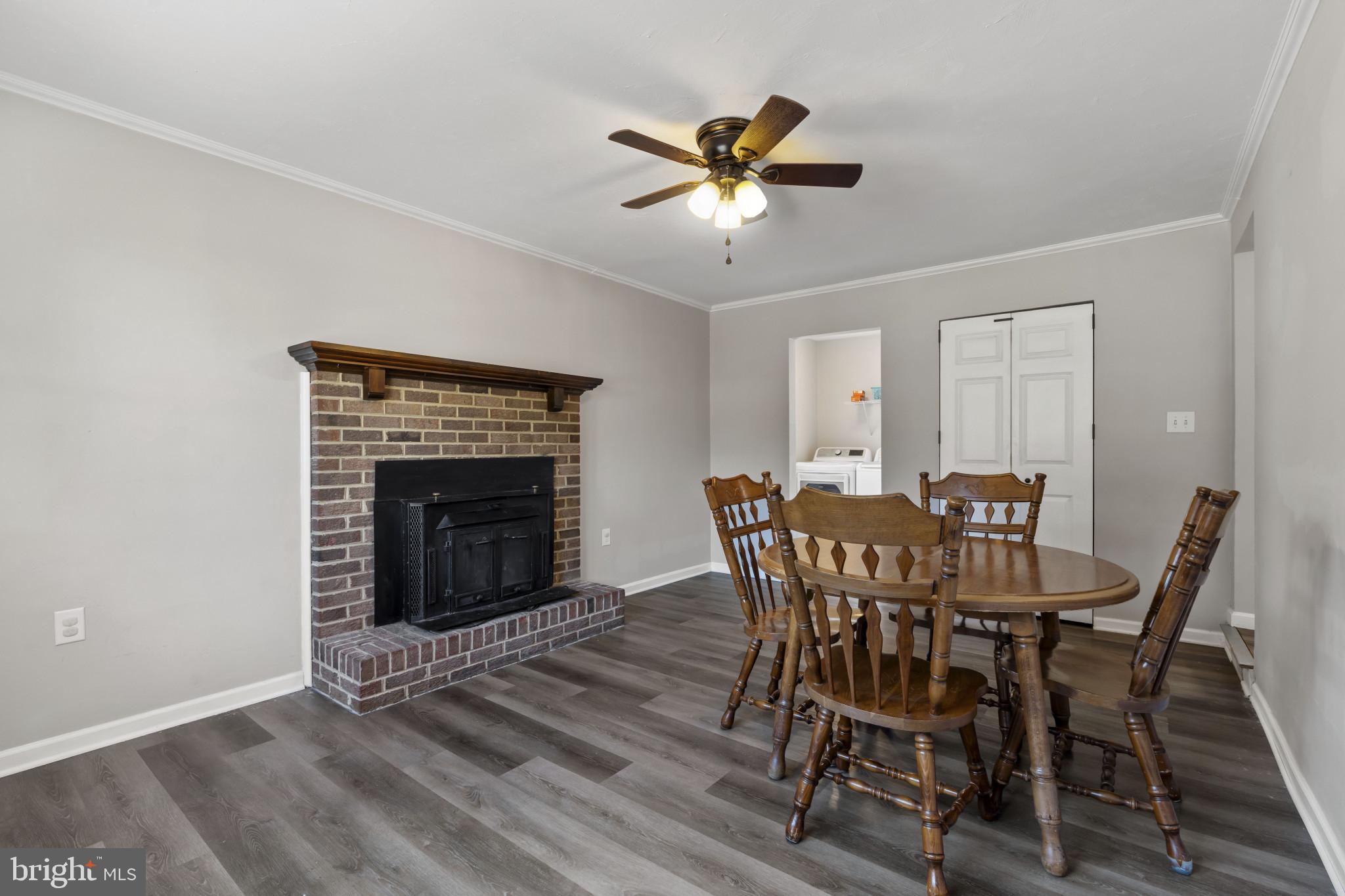 622 North West Street Dover, DE 19904 - Photo 12 of 23 a view of a dining room with furniture and a fireplace