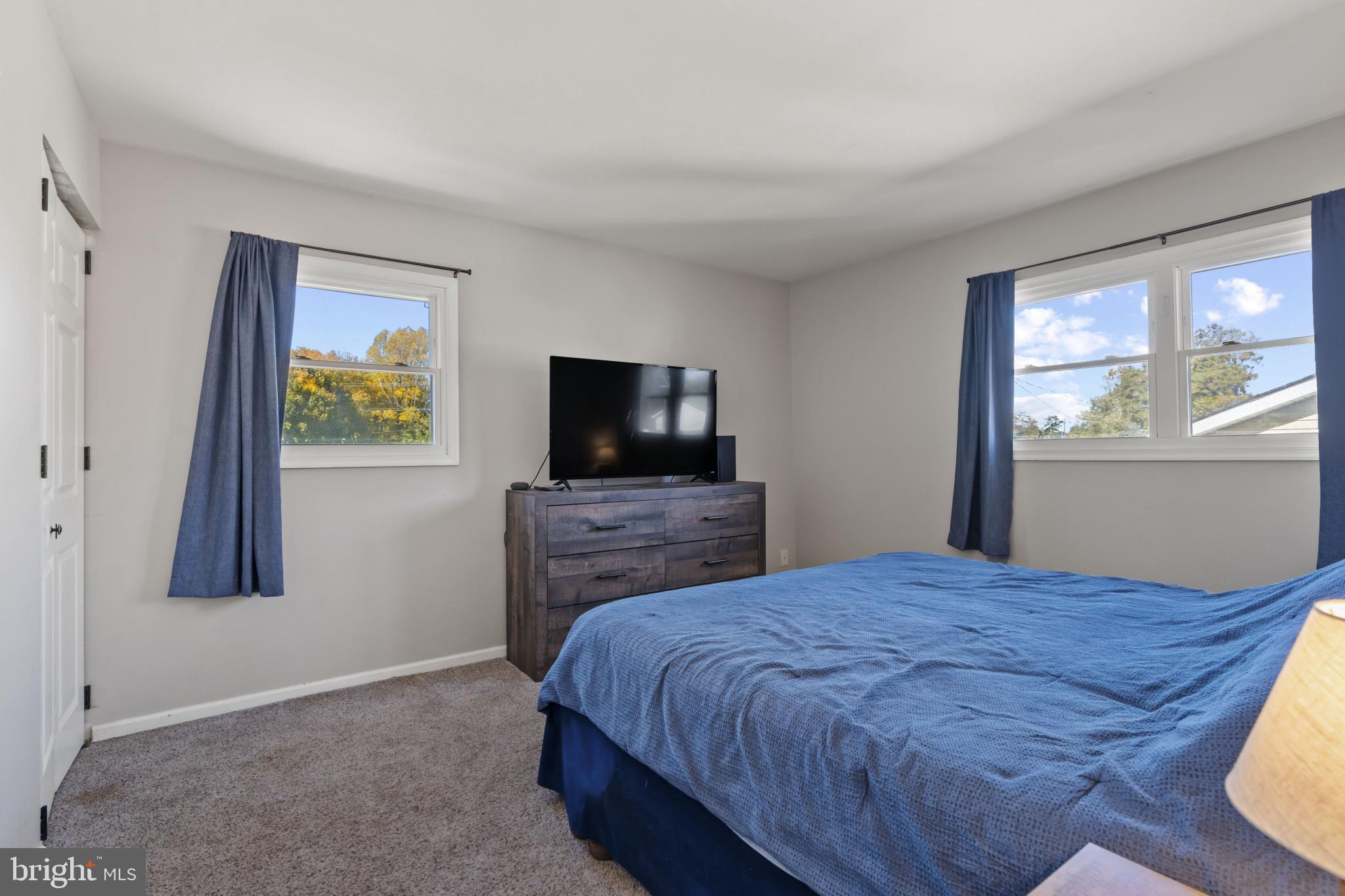622 North West Street Dover, DE 19904 - Photo 19 of 23 a bedroom with a bed and a flat screen tv