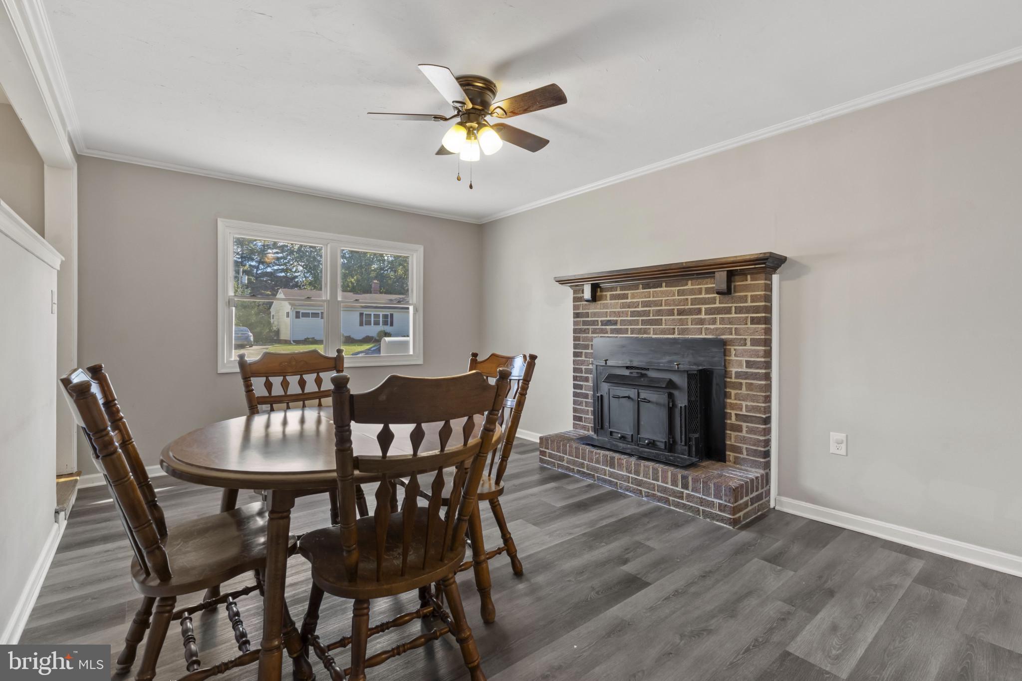 622 North West Street Dover, DE 19904 - Photo 10 of 23 a view of a dining room with furniture window and wooden floor