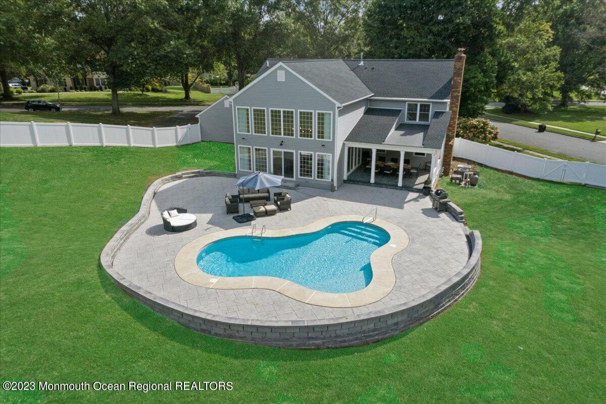 17 Quaker Road Middletown, NJ 07748 - Photo 4 of 65 a view of a house with a backyard