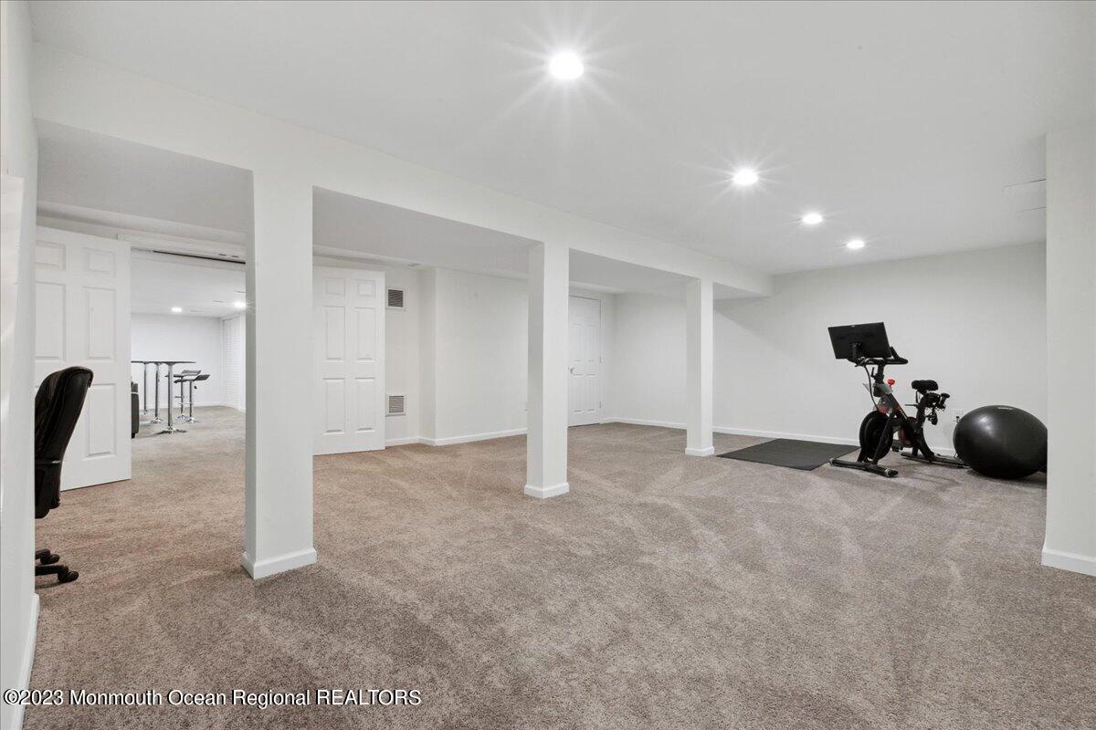 17 Quaker Road Middletown, NJ 07748 - Photo 42 of 65 a view of a room with gym equipment