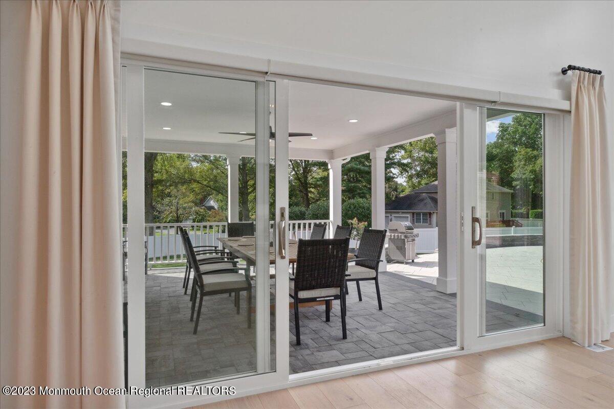 17 Quaker Road Middletown, NJ 07748 - Photo 49 of 65 a dining room with furniture window and outside view