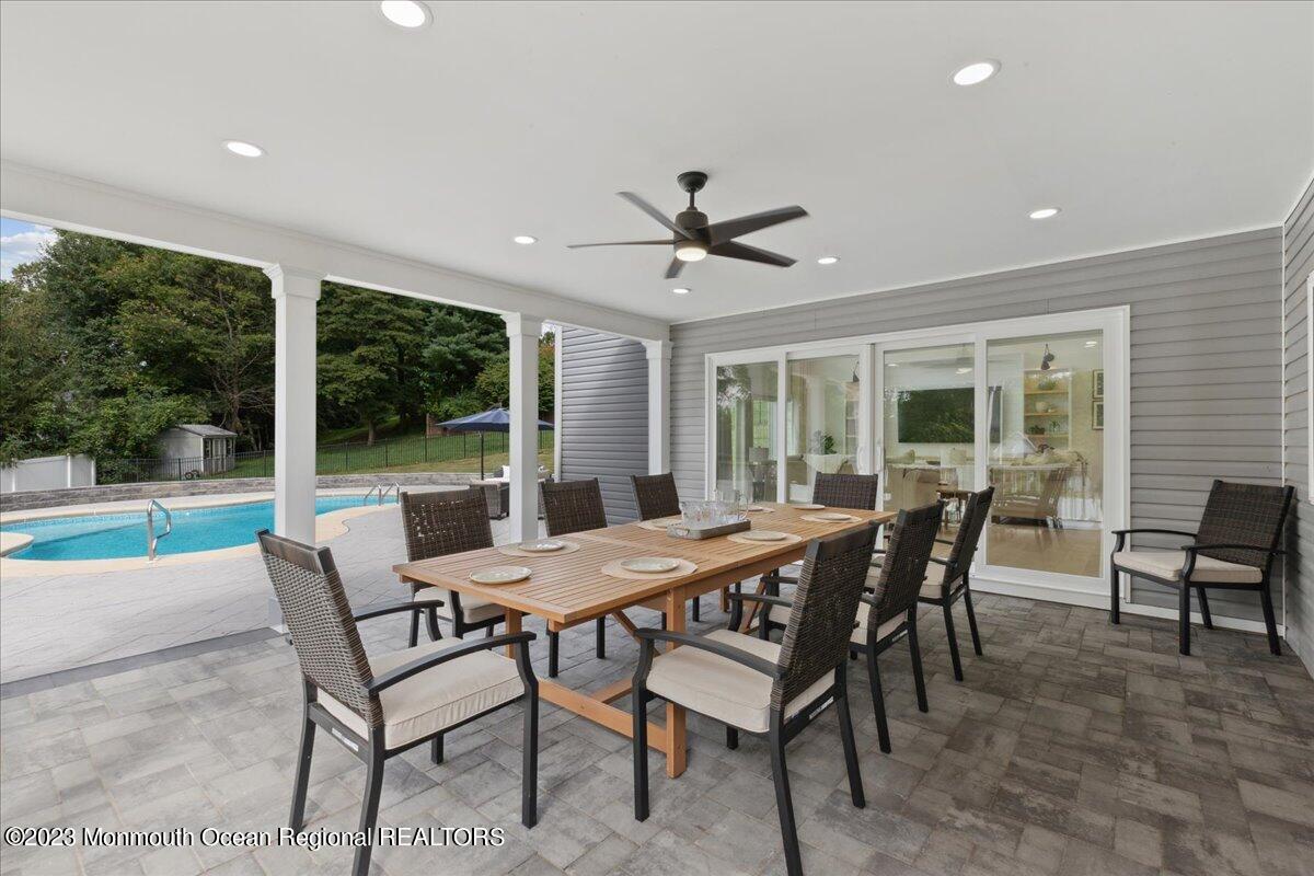 17 Quaker Road Middletown, NJ 07748 - Photo 51 of 65 a view of a dining room with furniture window and outside view