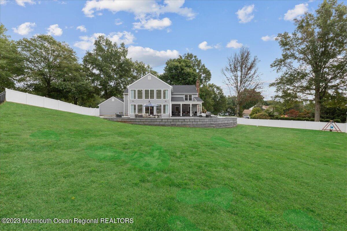 17 Quaker Road Middletown, NJ 07748 - Photo 57 of 65 a view of a house with a big yard